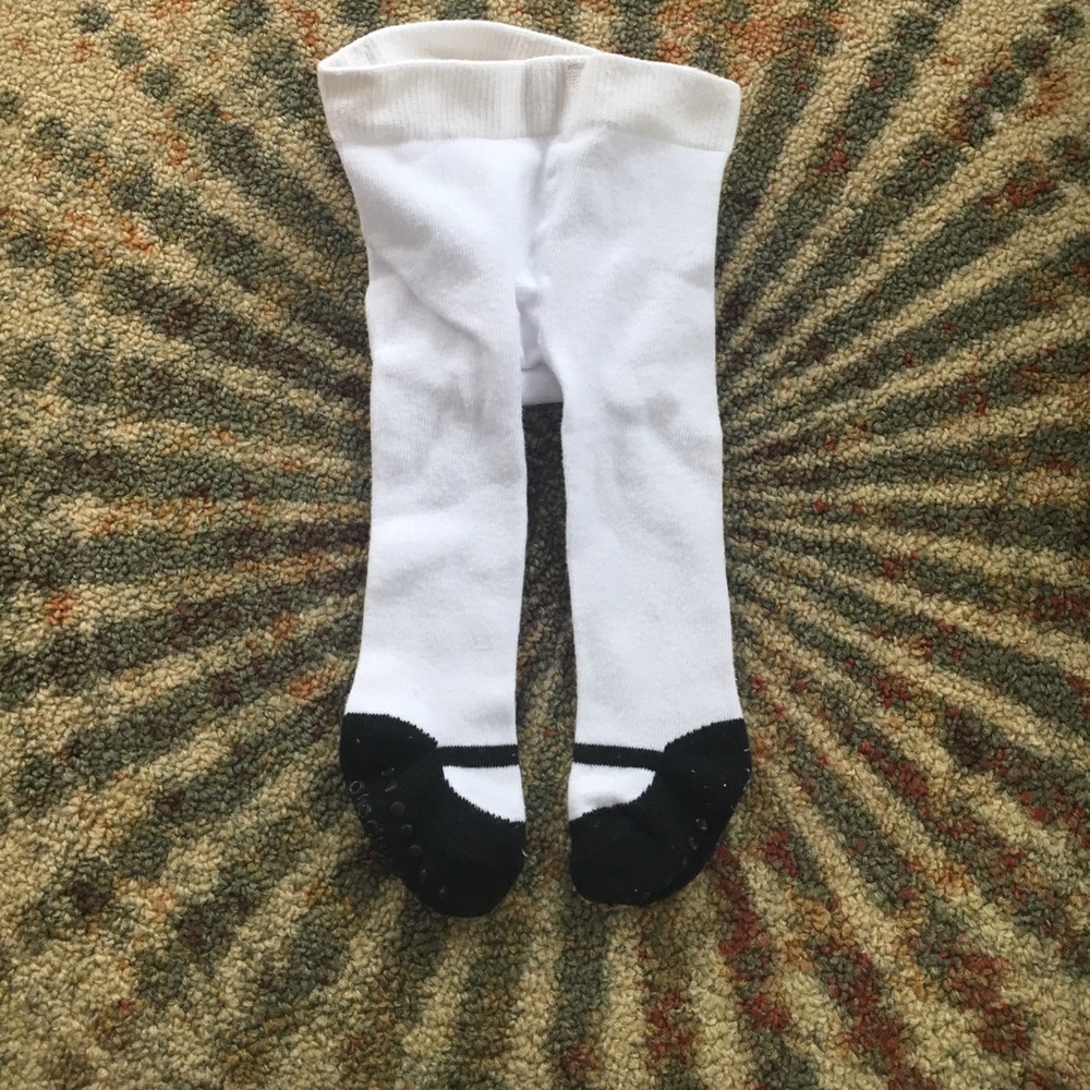White tights with black ballerina shoe accent